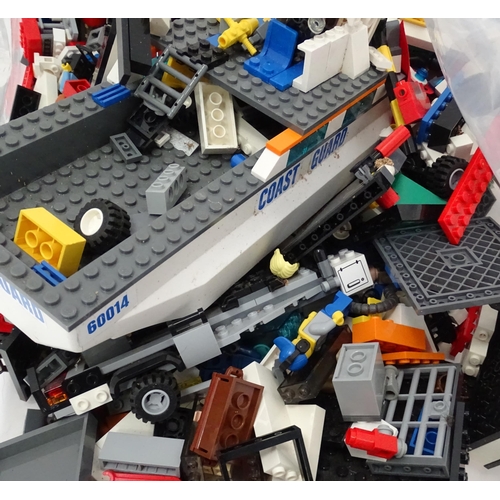835 - Toys: A quantity of Lego to include bricks, wheels and figures etc.