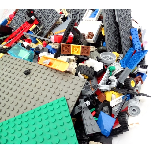 854 - A quantity of Lego to include bricks, wheels and figures etc.