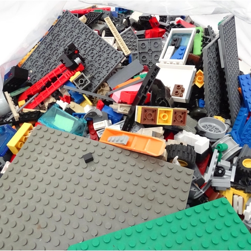 854 - A quantity of Lego to include bricks, wheels and figures etc.