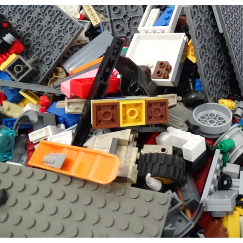 854 - A quantity of Lego to include bricks, wheels and figures etc.