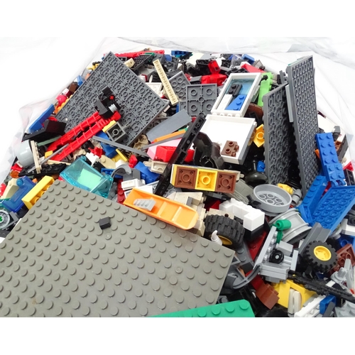 854 - A quantity of Lego to include bricks, wheels and figures etc.