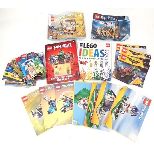 857 - A quantity of Lego books, leaflets, instruction manuals etc. to include The Lego Ideas Book, Ninjago... 