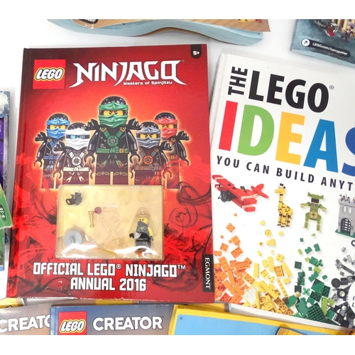 857 - A quantity of Lego books, leaflets, instruction manuals etc. to include The Lego Ideas Book, Ninjago... 