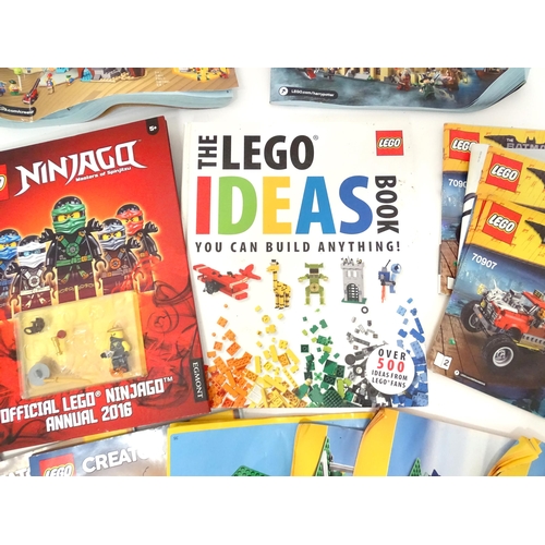 857 - A quantity of Lego books, leaflets, instruction manuals etc. to include The Lego Ideas Book, Ninjago... 