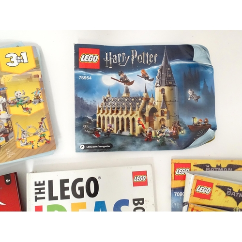 857 - A quantity of Lego books, leaflets, instruction manuals etc. to include The Lego Ideas Book, Ninjago... 