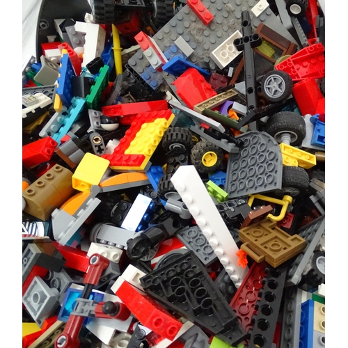 873 - A quantity of Lego to include bricks, wheels and figures etc.