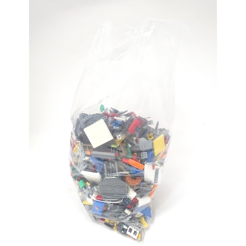 873 - A quantity of Lego to include bricks, wheels and figures etc.