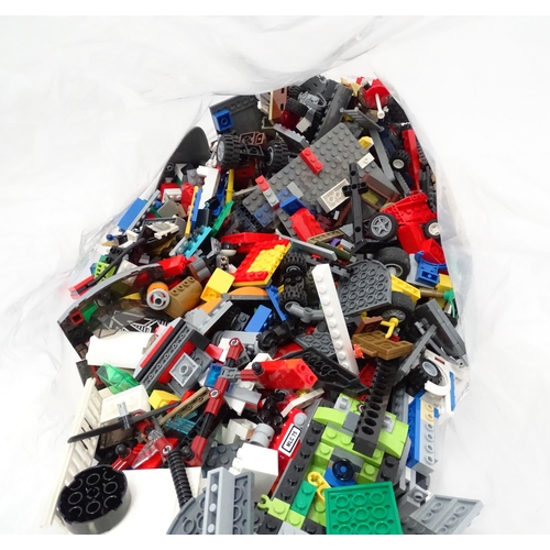 873 - A quantity of Lego to include bricks, wheels and figures etc.