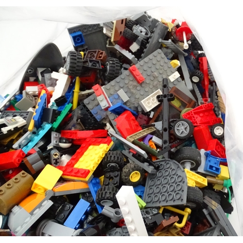 873 - A quantity of Lego to include bricks, wheels and figures etc.