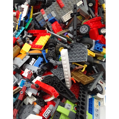 873 - A quantity of Lego to include bricks, wheels and figures etc.