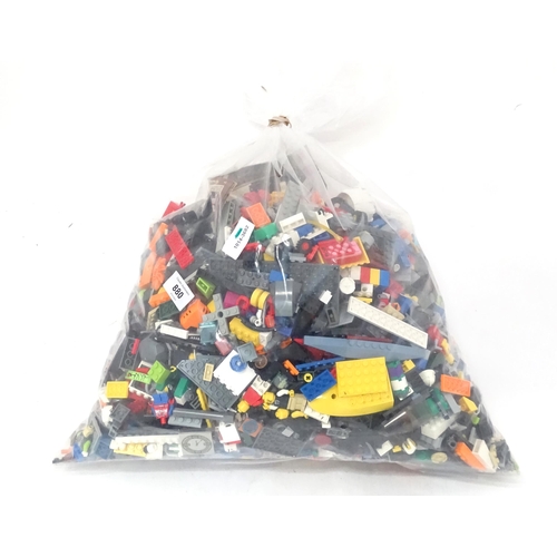 880 - A quantity of Lego to include bricks, wheels and figures etc.