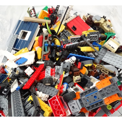 894 - A quantity of Lego to include bricks, wheels and figures etc.