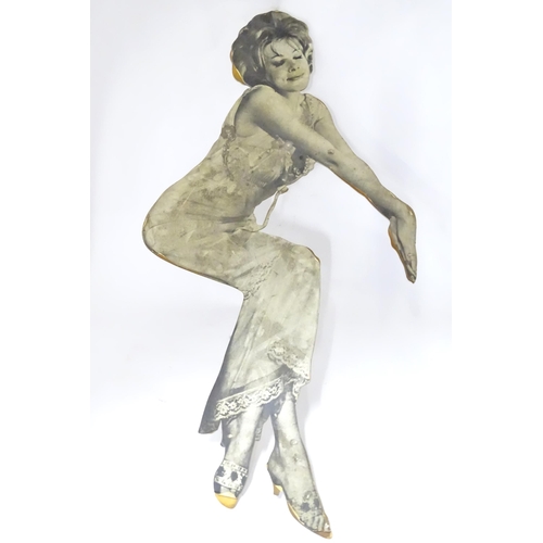 313 - A mid 20thC photographic bed advertising board depicting a female figure, approx 55