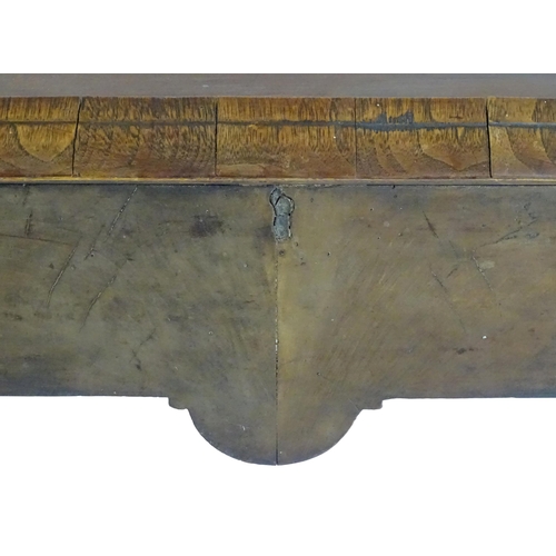 656 - An 18thC walnut cabinet / chest stand, the carved apron standing on four shaped cabriole legs, appro... 