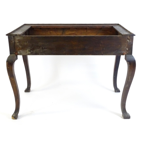 656 - An 18thC walnut cabinet / chest stand, the carved apron standing on four shaped cabriole legs, appro... 