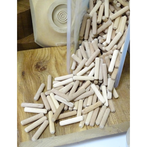 760 - A quantity of carpentry / woodworking specimen woods, dowels and biscuits etc.