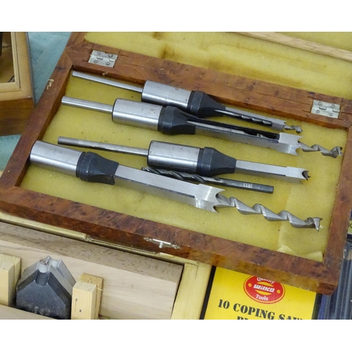 831 - A large quantity of carpentry / woodworking drill bits , coping saw blades , tools etc to include bo... 
