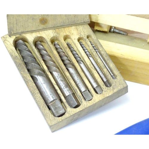 831 - A large quantity of carpentry / woodworking drill bits , coping saw blades , tools etc to include bo... 