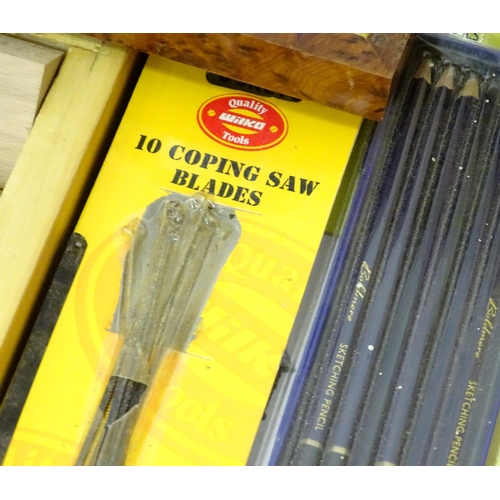 831 - A large quantity of carpentry / woodworking drill bits , coping saw blades , tools etc to include bo... 