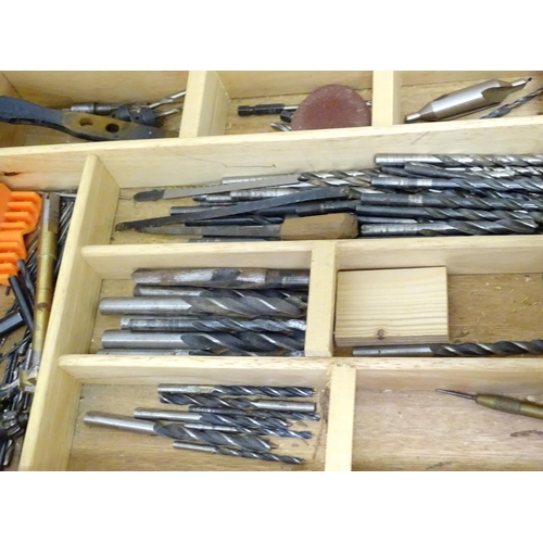 831 - A large quantity of carpentry / woodworking drill bits , coping saw blades , tools etc to include bo... 