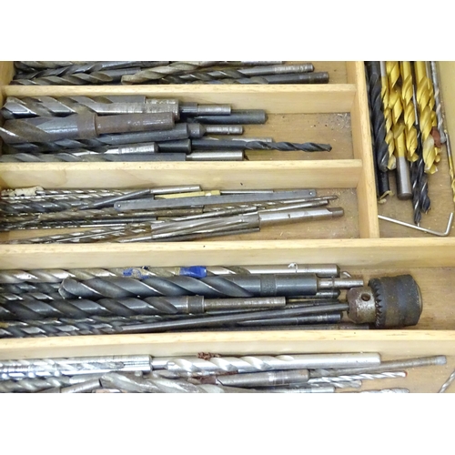831 - A large quantity of carpentry / woodworking drill bits , coping saw blades , tools etc to include bo... 
