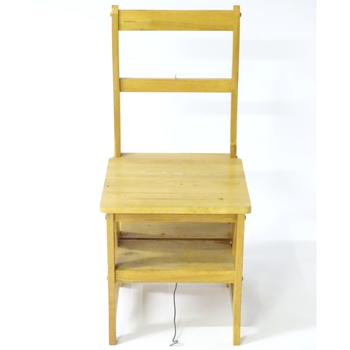 890 - A contemporary metamorphic library step chair, approx 35