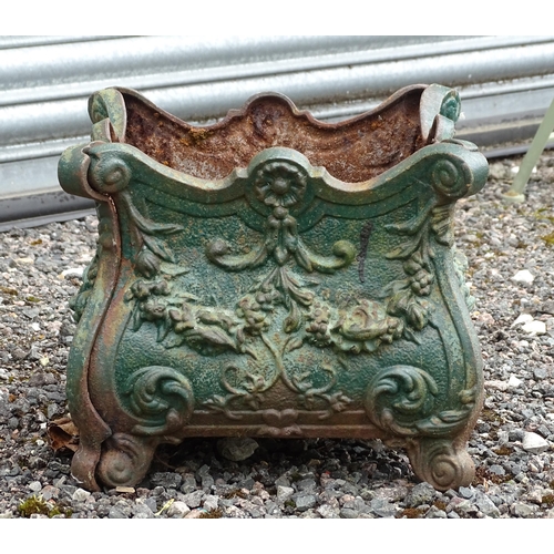 904 - Garden & Architectural : a cast iron planter of classical form with shell and swag detail, approx 13... 