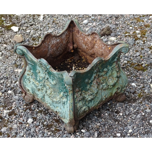 904 - Garden & Architectural : a cast iron planter of classical form with shell and swag detail, approx 13... 