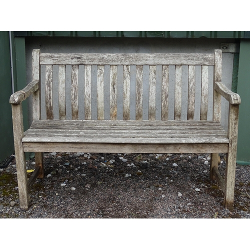 908 - Garden & Architectural : a teak two-seater garden bench, approx 48