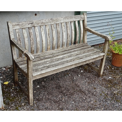 908 - Garden & Architectural : a teak two-seater garden bench, approx 48