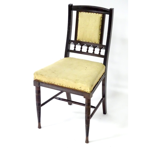 220 - A late 19th / early 20thC Bruce James Talbert design chair.