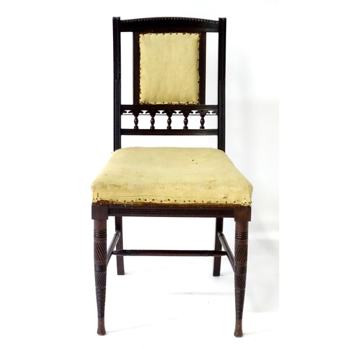 220 - A late 19th / early 20thC Bruce James Talbert design chair.