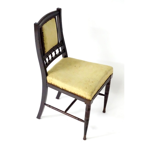 220 - A late 19th / early 20thC Bruce James Talbert design chair.