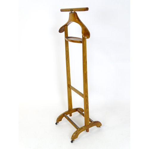 31 - A Harrods valet stand/ dumb butler. Approx. 44