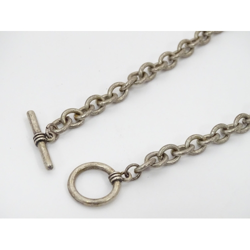 324 - A quantity of assorted items, comprising a 1953 Queen Elizabeth II coronation crown / five shillings... 