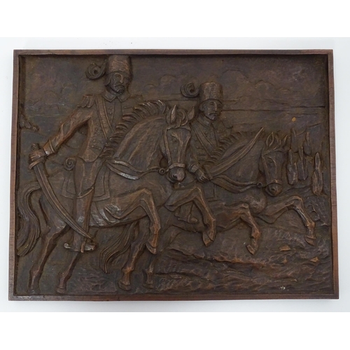 325 - A quantity of assorted items to include a carved wooden plaque depicting charging Cossacks / mounted... 