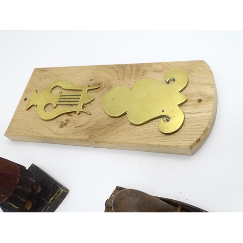 325 - A quantity of assorted items to include a carved wooden plaque depicting charging Cossacks / mounted... 