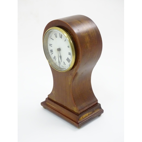 44 - A mahogany cased balloon mantle clock with French movement. Approx. 9