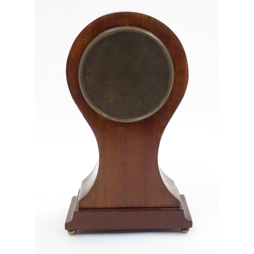 44 - A mahogany cased balloon mantle clock with French movement. Approx. 9