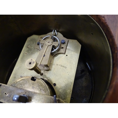 44 - A mahogany cased balloon mantle clock with French movement. Approx. 9