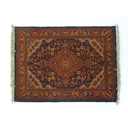 697 - Carpet / Rug : A Louis de Poortere Samarkand blue ground rug with geometric detail. Approx. 38