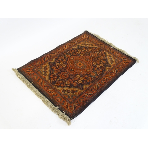 697 - Carpet / Rug : A Louis de Poortere Samarkand blue ground rug with geometric detail. Approx. 38