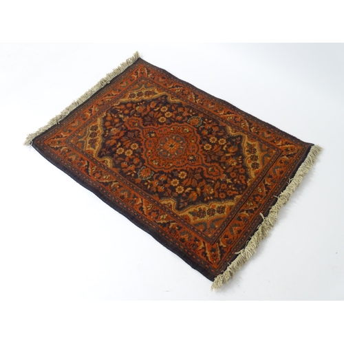 697 - Carpet / Rug : A Louis de Poortere Samarkand blue ground rug with geometric detail. Approx. 38