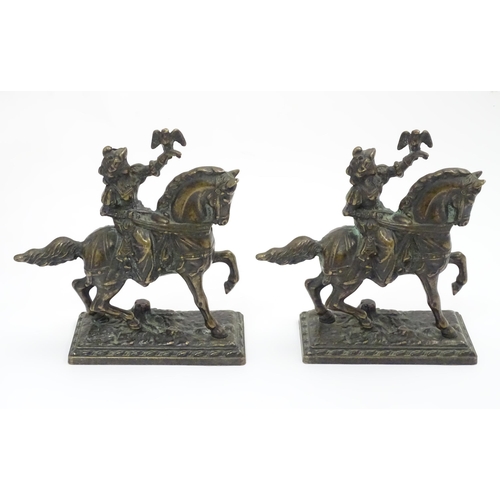 861 - A quantity of assorted metal ware to include spelter figures, cast models of falconers on horseback,... 