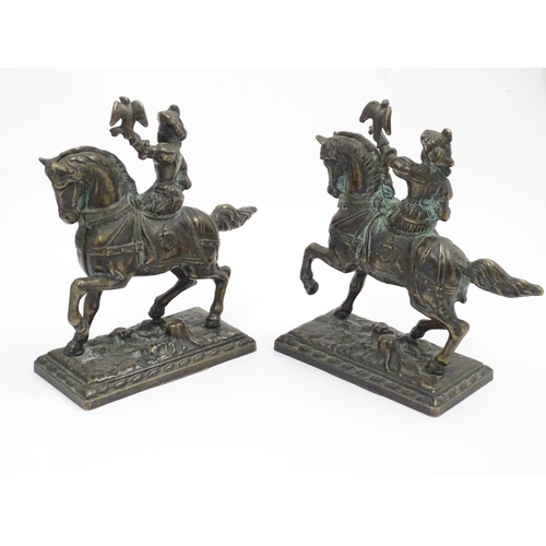 861 - A quantity of assorted metal ware to include spelter figures, cast models of falconers on horseback,... 