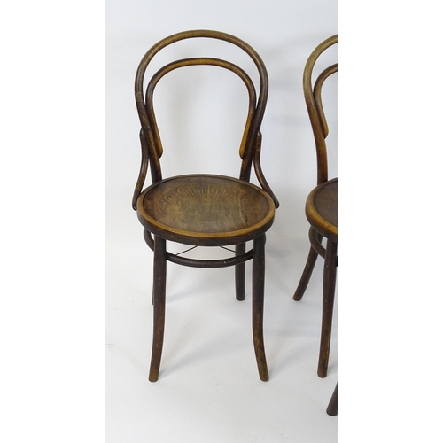 326 - A group of four early / mid 20thC bentwood chairs. Seat height 18 1/2