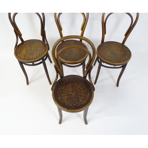 326 - A group of four early / mid 20thC bentwood chairs. Seat height 18 1/2