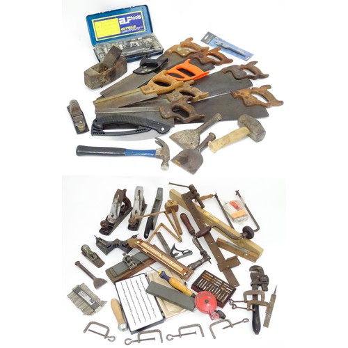 302 - A quantity of mid to late 20thC hand tools , to include saws, drills, planes, vice, socket set, rule... 