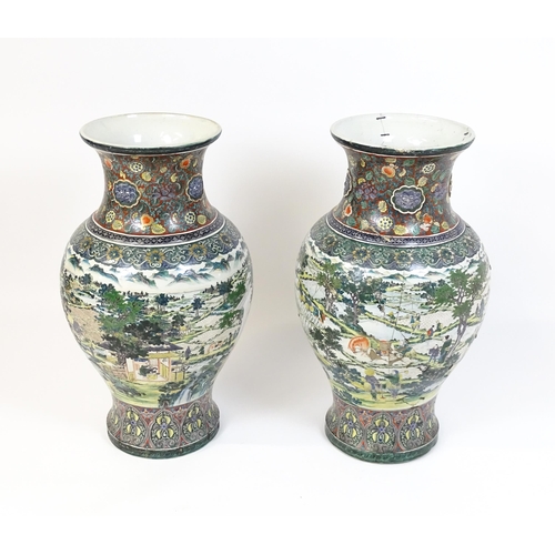 53 - A pair of large Chinese famille verte vases decorated with farming scenes with figures harvesting fi... 