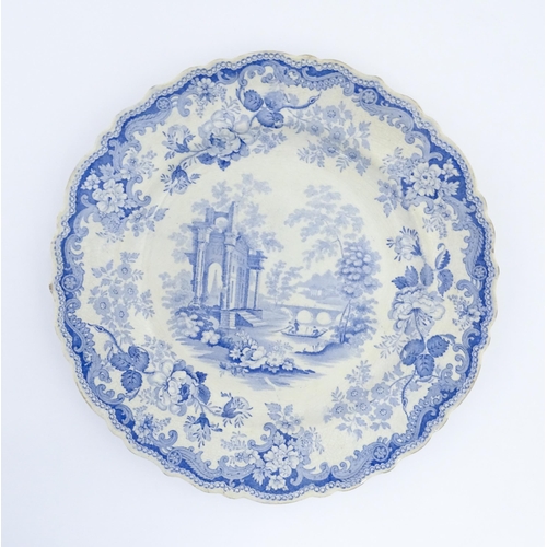 84 - A 19thC Rogers blue and white plate decorated in the Athens pattern. Marked under. Approx. 10 1/2